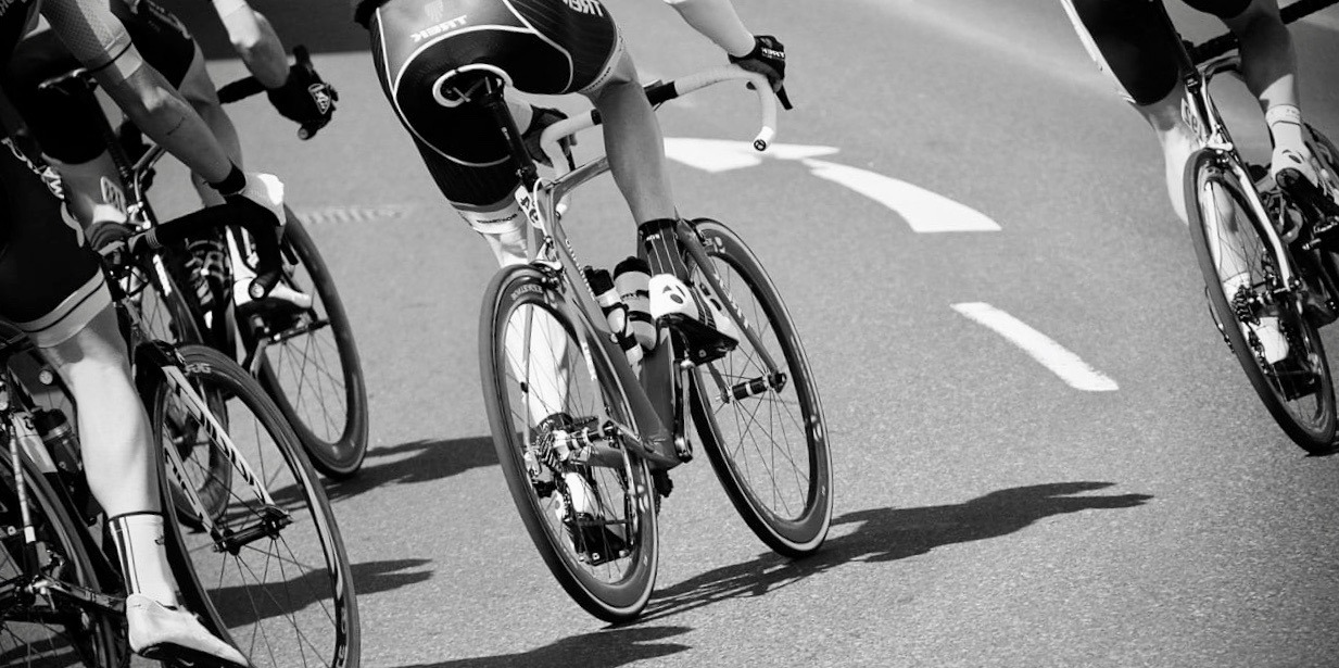 Cyclist cycling along a road